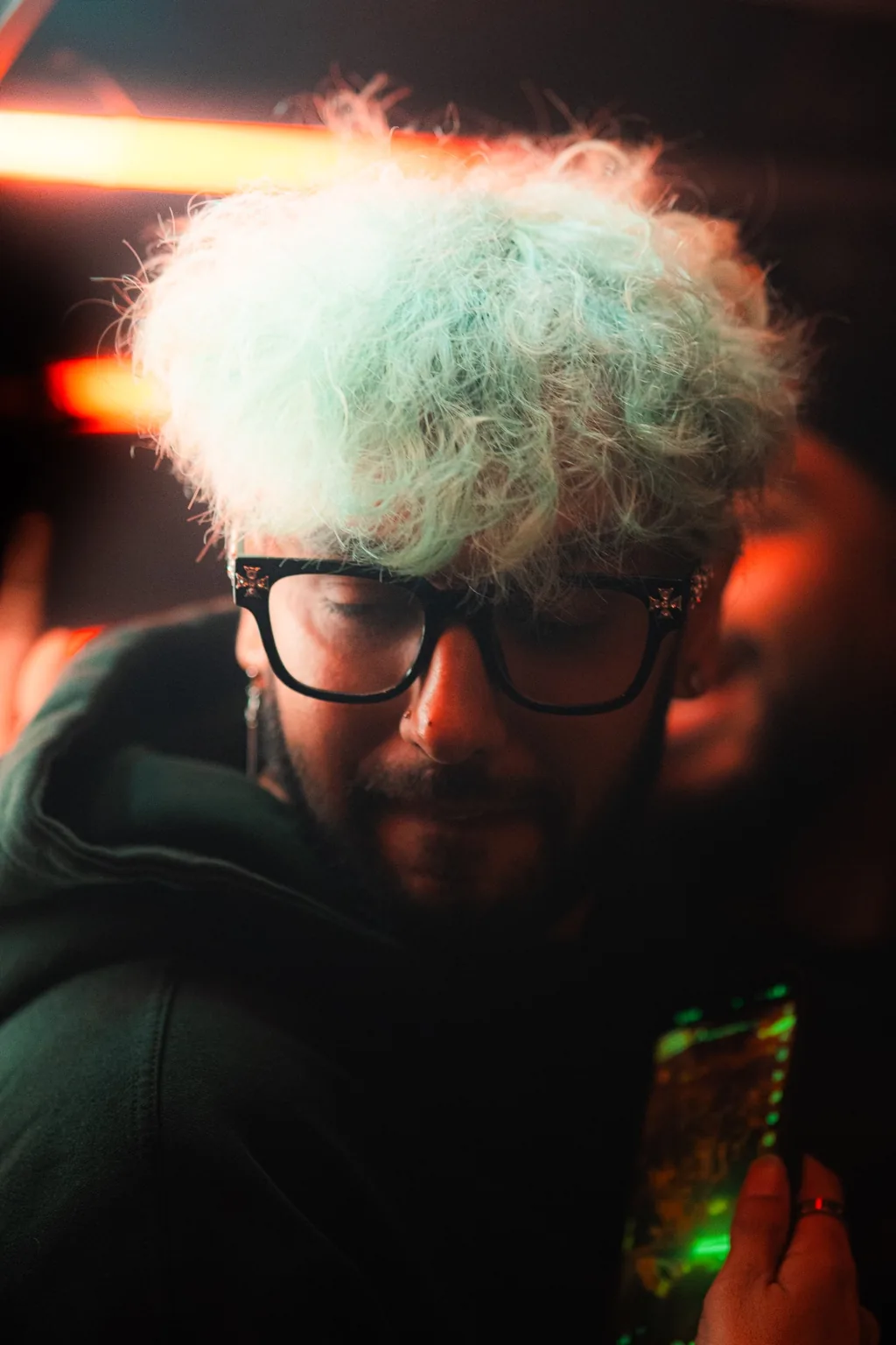 Guest with light hair and glasses in the crowd at Project Kulture.