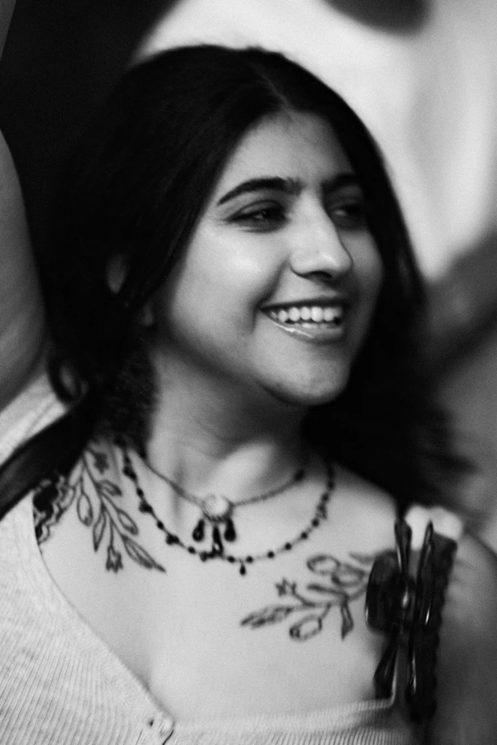 Black and white portrait of a guest looking to the side at Project Kulture.