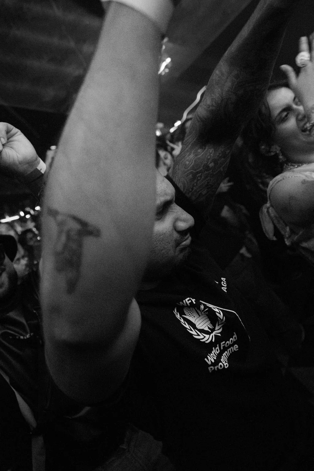 Black and white close up of a guest dancing at Project Kulture.